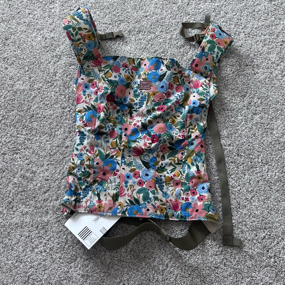 New with tags Toddler Happy Baby Carrier in the print Garden Party